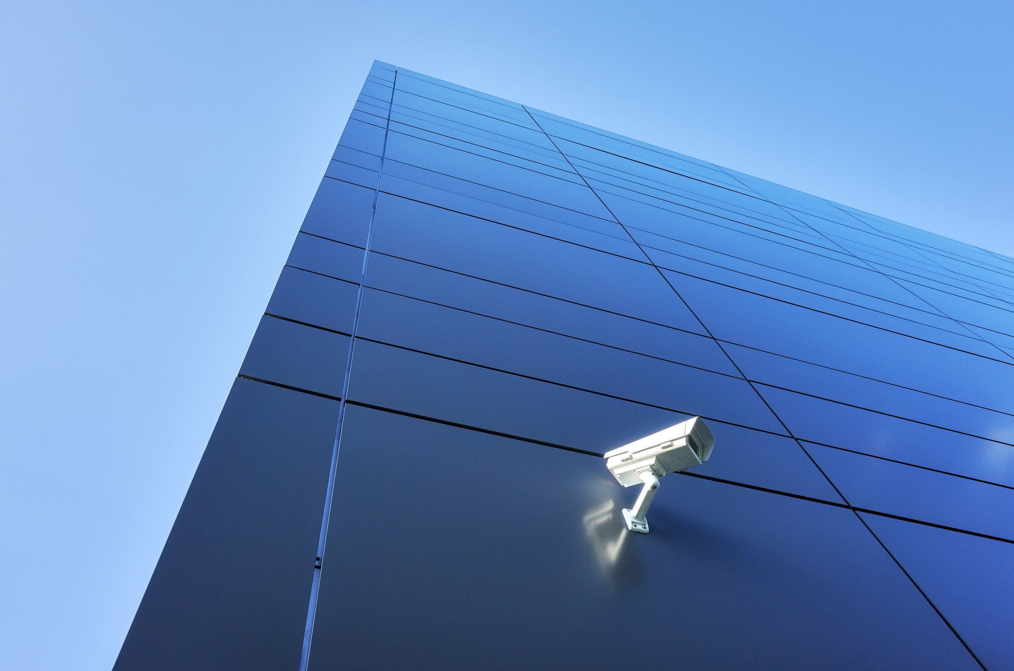 CCTV camera on an office building wall.